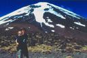 Us, on the Tongariro Crossing route across the Park.  One of the three volcanic peaks behind us.